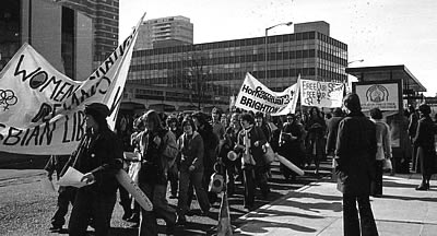 Marching through Churchill Square in Brighton
	  